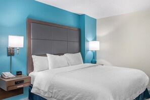 Desk, laptop workspace, blackout curtains, iron/ironing board