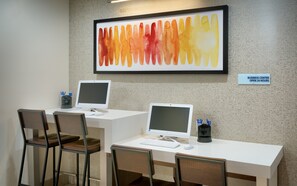 A business center with two desks, each with a computer, keyboard, mouse, and cup holder. - Holiday Inn Express & Suites American Fork - North Provo by IHG (American Fork)