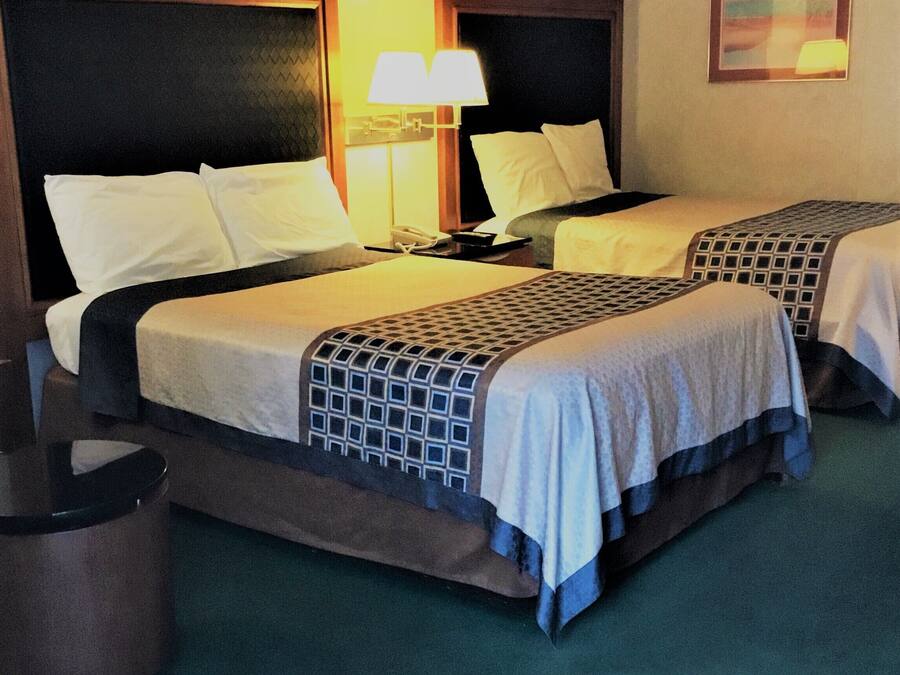 Blackout drapes, iron/ironing board, free cribs/infant beds