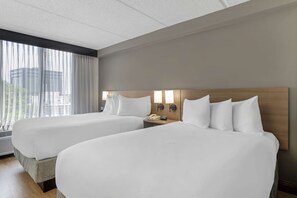 Premium bedding, down comforters, desk, laptop workspace
