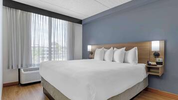 Premium bedding, down duvets, desk, laptop workspace