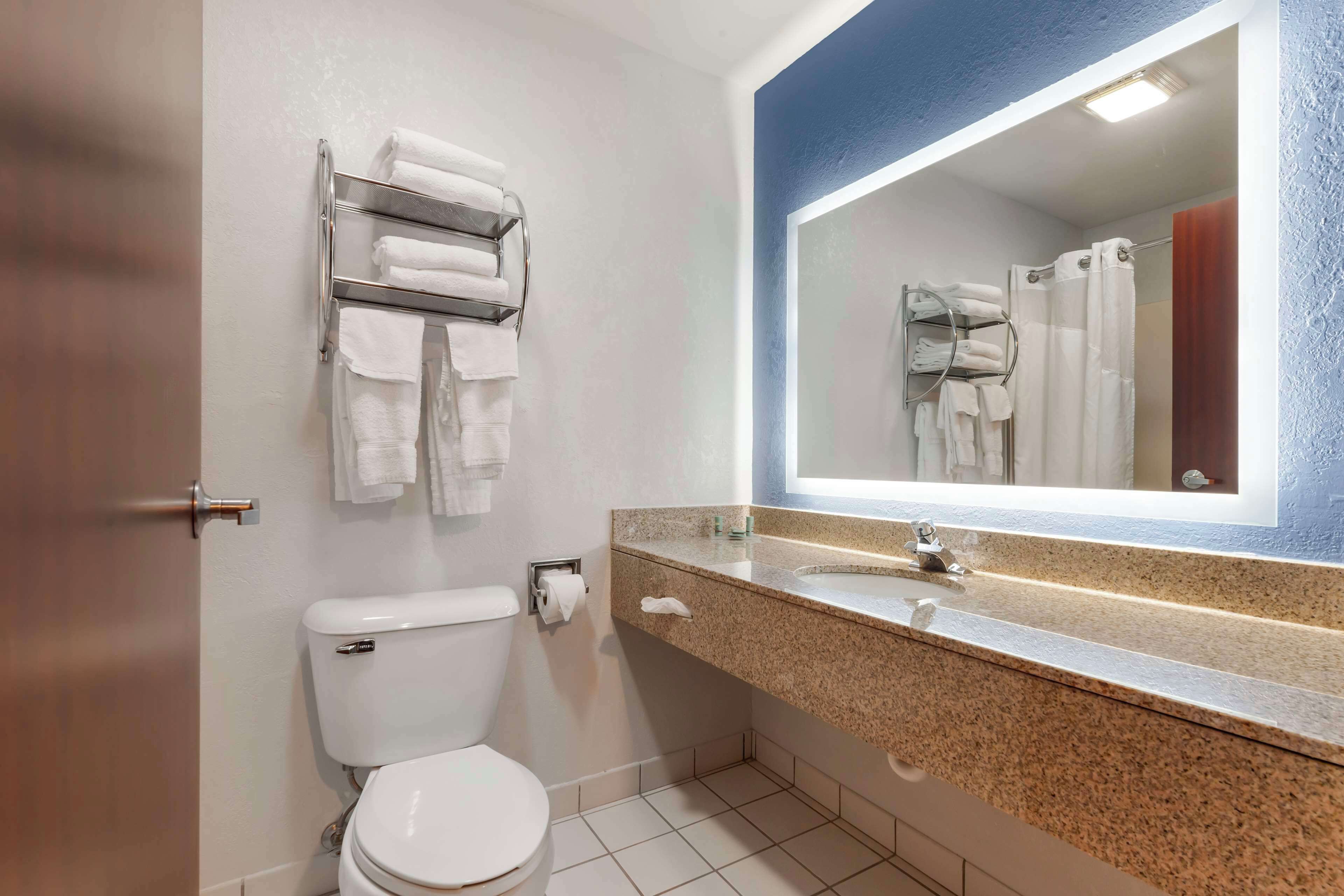 standard room, 1 king bed, non smoking, refrigerator & microwave (with sofabed) | bathroom | combined shower/bathtub, hair dryer, towels