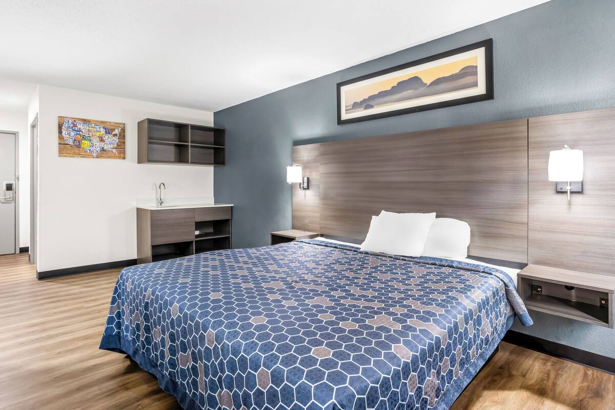 Suite, 1 King Bed, Non Smoking (Efficiency) | Desk, laptop workspace, blackout curtains, iron/ironing board