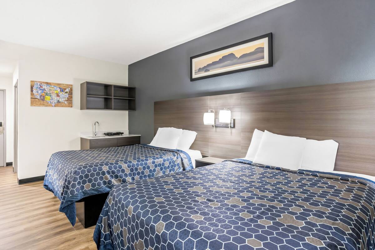 Suite, 2 Queen Beds, Non Smoking (Efficiency) | Desk, laptop workspace, blackout curtains, iron/ironing board