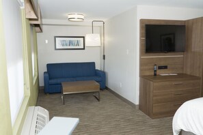Suite, 1 King Bed | In-room safe, desk, blackout drapes, iron/ironing board