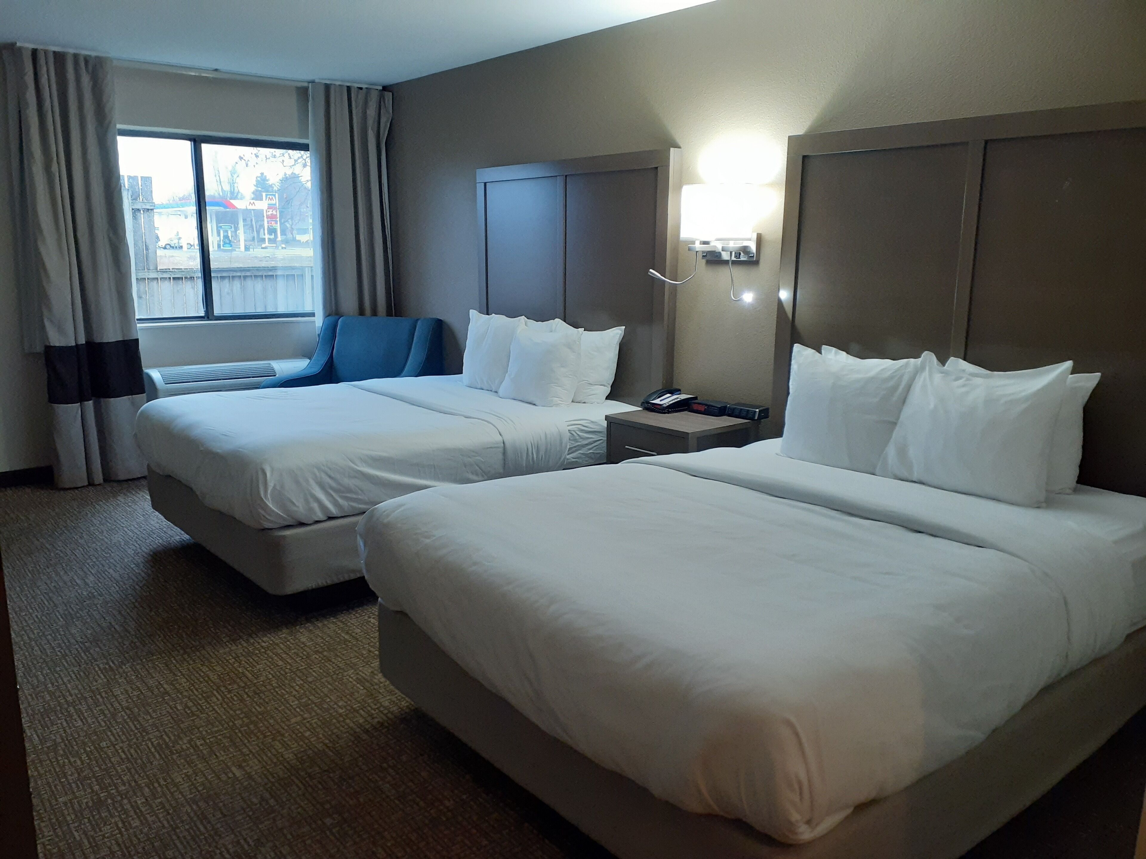 standard room, 2 queen beds, non smoking | desk, laptop workspace, iron/ironing board, free wifi