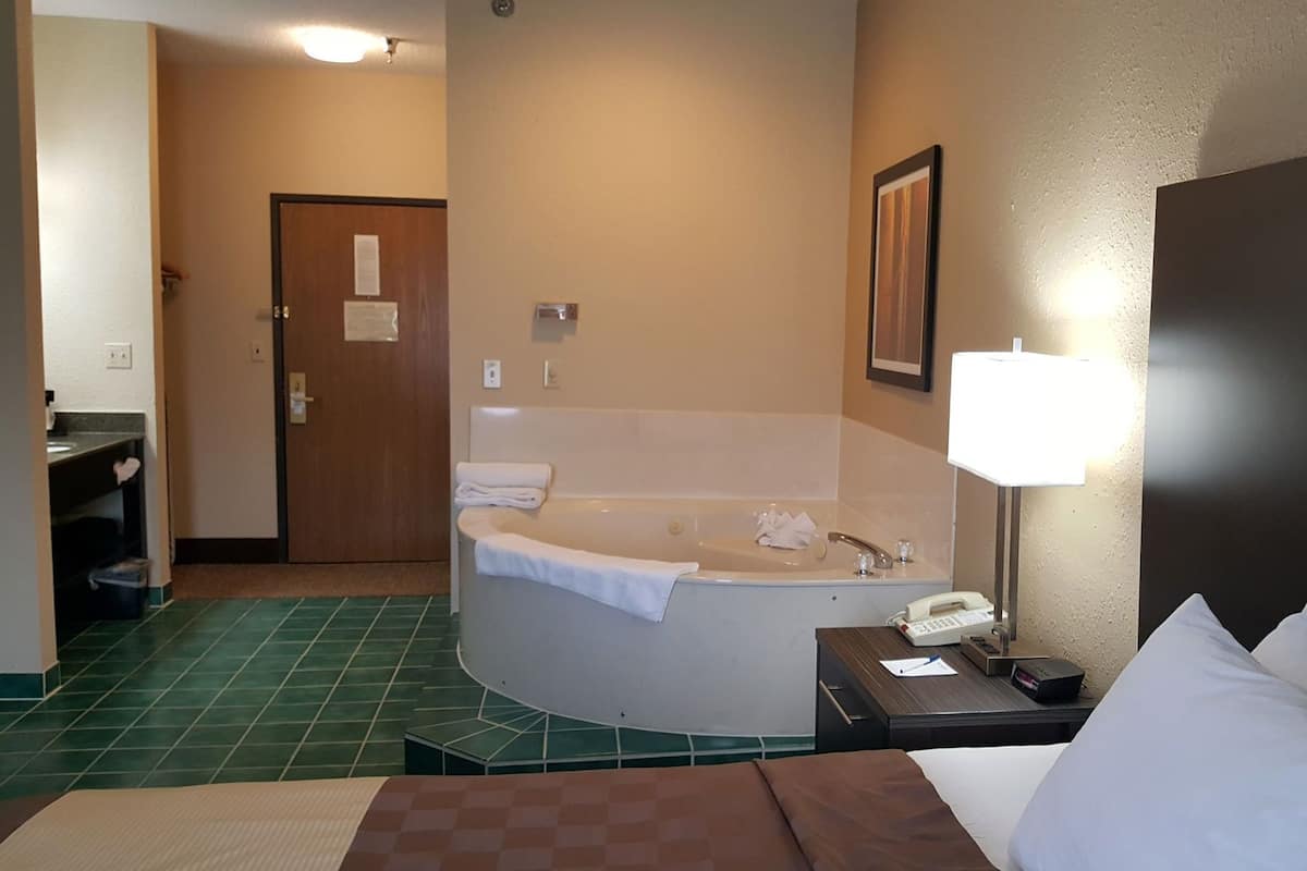 Desk, laptop workspace, blackout curtains, iron/ironing board