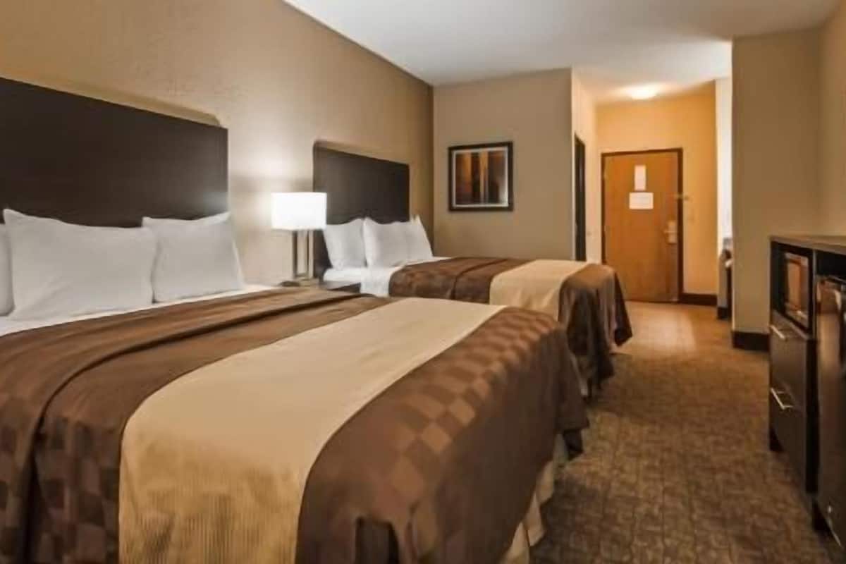 Desk, laptop workspace, blackout curtains, iron/ironing board