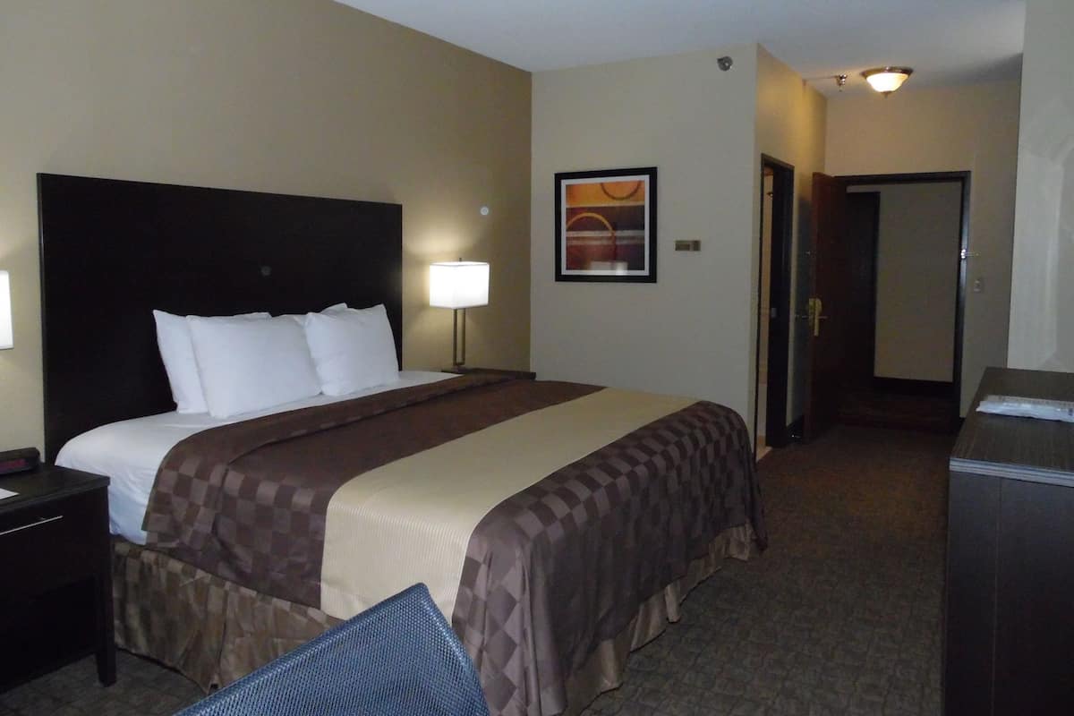 Desk, laptop workspace, blackout curtains, iron/ironing board