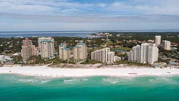 White sand, free beach shuttle, beach cabanas, beach bar