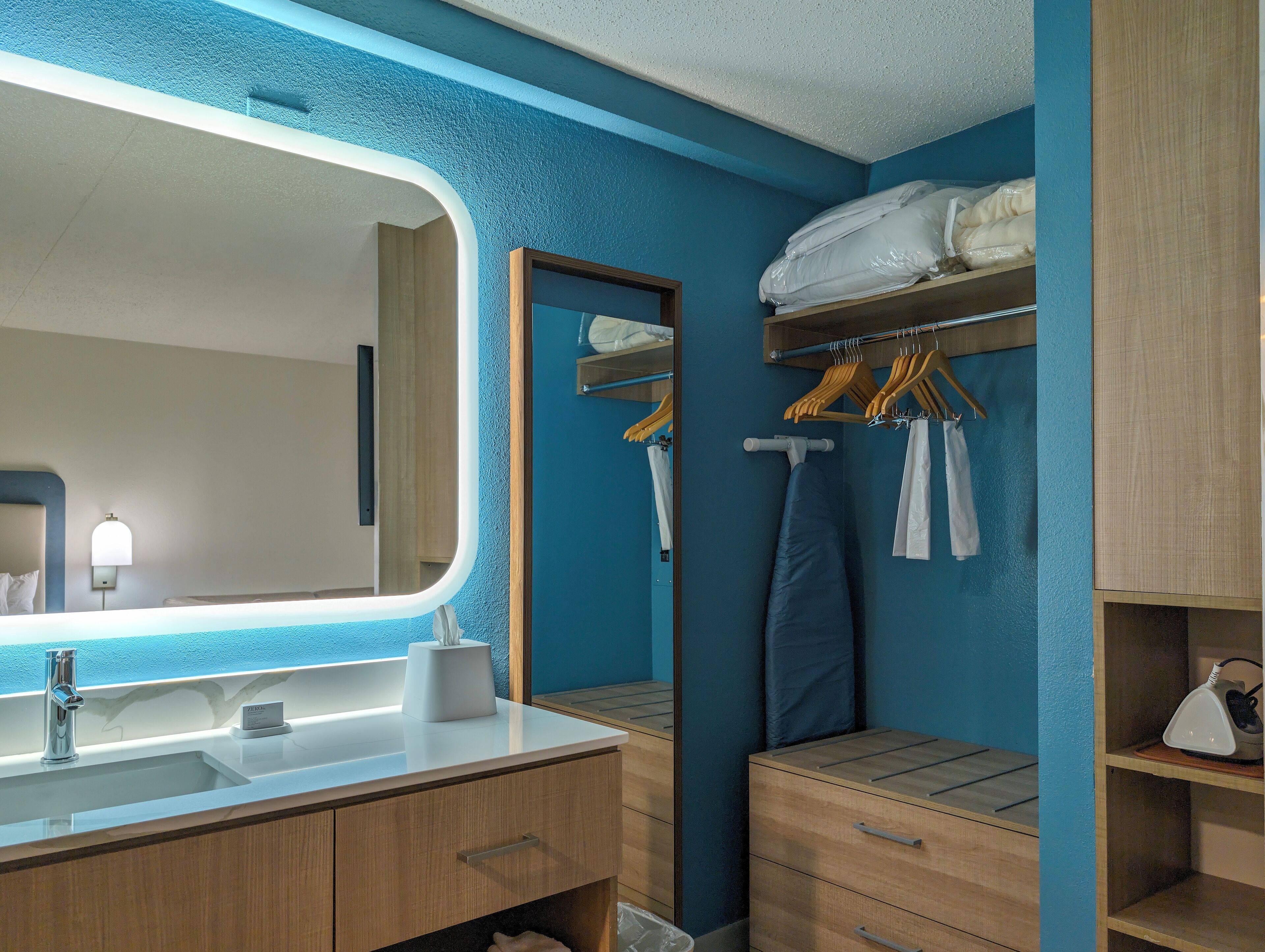 designer toiletries, hair dryer, towels, soap