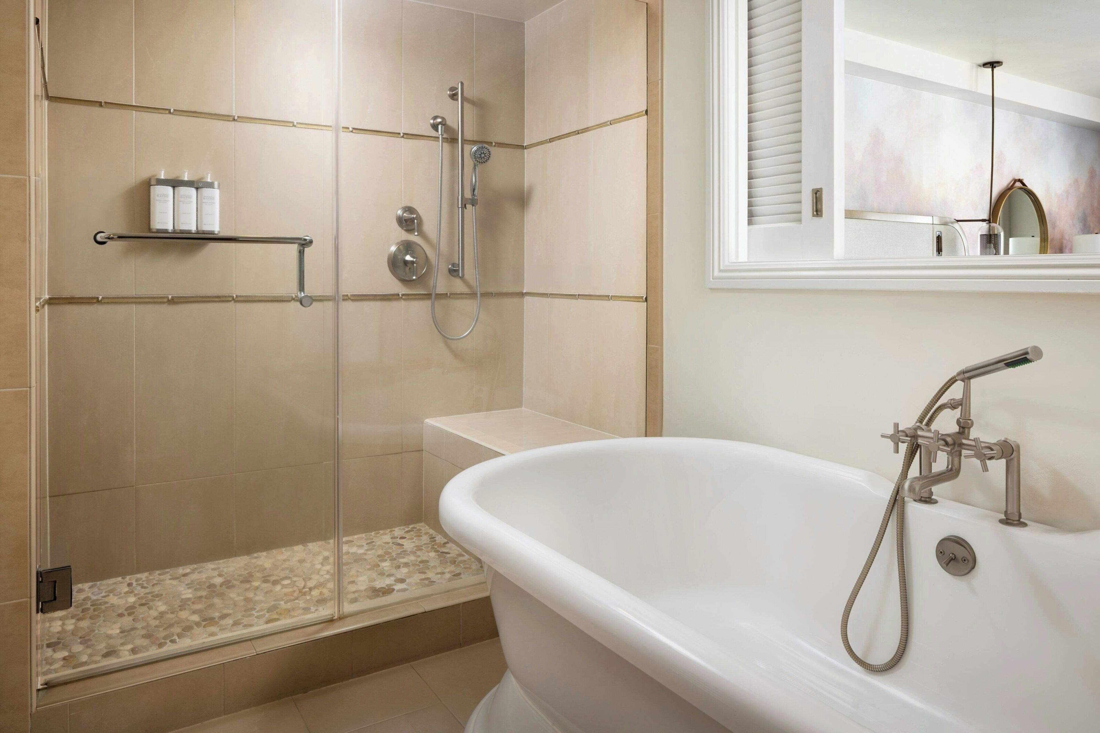 suite, 1 king bed with sofa bed, pool view | bathroom | shower, hair dryer, bathrobes, towels