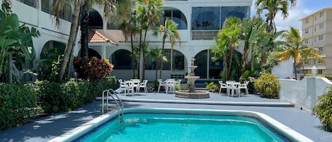 Outdoor pool, pool umbrellas, pool loungers