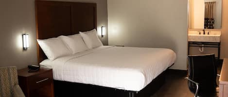 Chambre Standard, 1 très grand lit, non-fumeurs | Bureau, espace de travail pour ordinateur portable, rideaux occultants