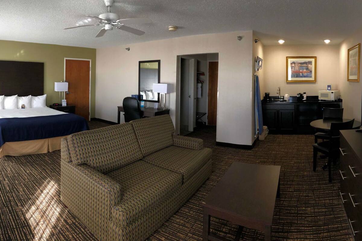 Desk, blackout curtains, soundproofing, iron/ironing board