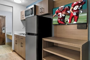Studio, 1 King Bed, Non Smoking | Private kitchen | Full-size fridge, microwave, stovetop