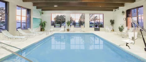 Indoor pool, open 6:00 AM to 10:00 PM, sun loungers