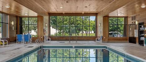 Indoor pool, open 6:00 AM to midnight, pool loungers