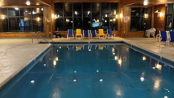 Indoor pool, open 6:00 AM to midnight, pool loungers