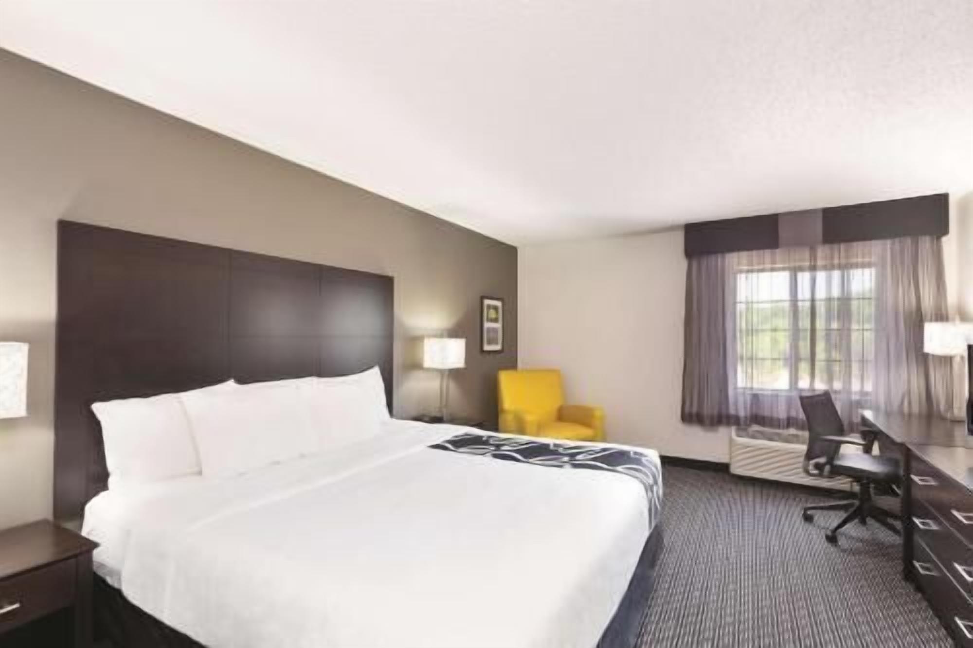 Premium bedding, down duvets, desk, laptop workspace