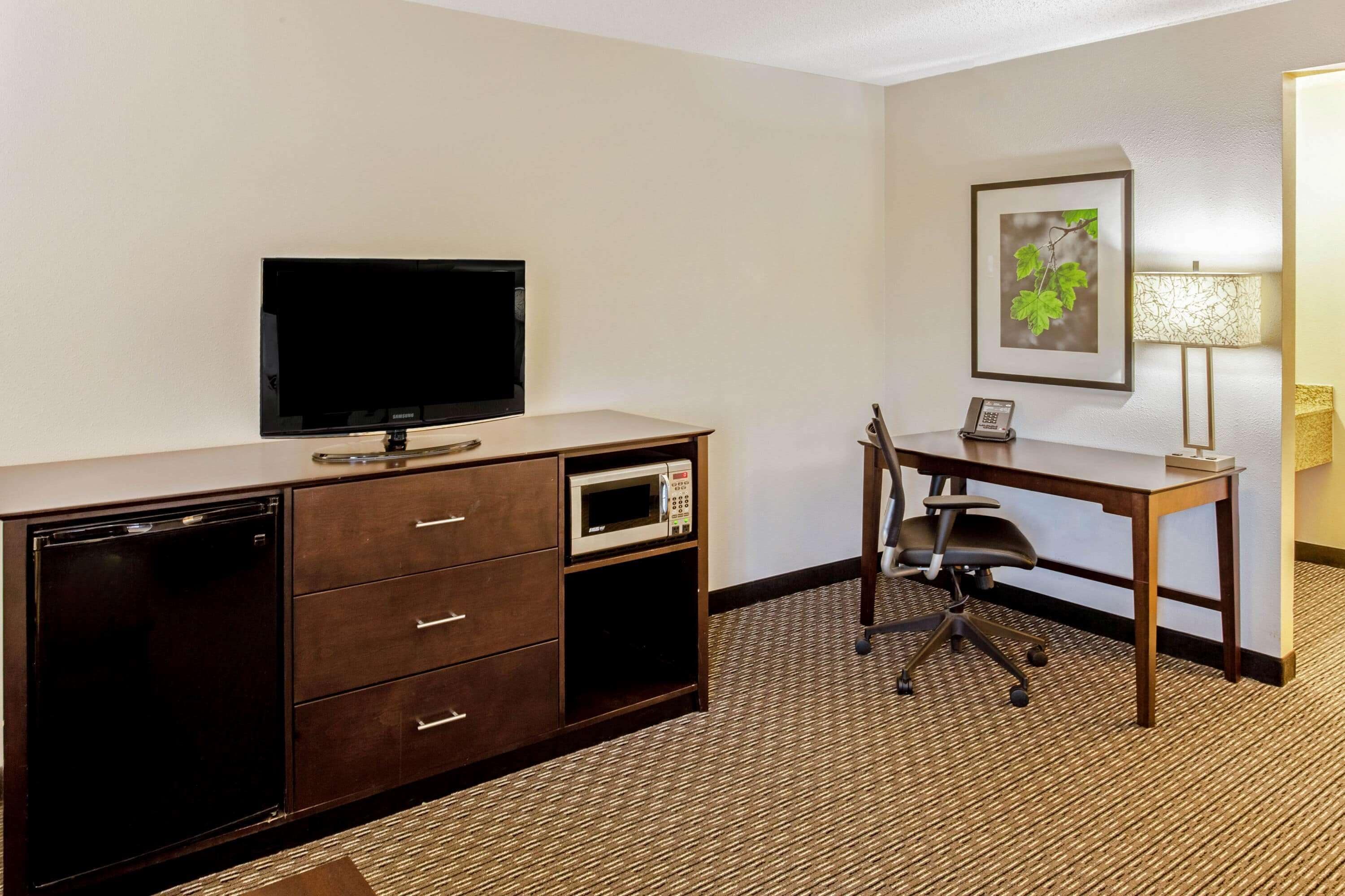 premium bedding, down duvets, desk, laptop workspace