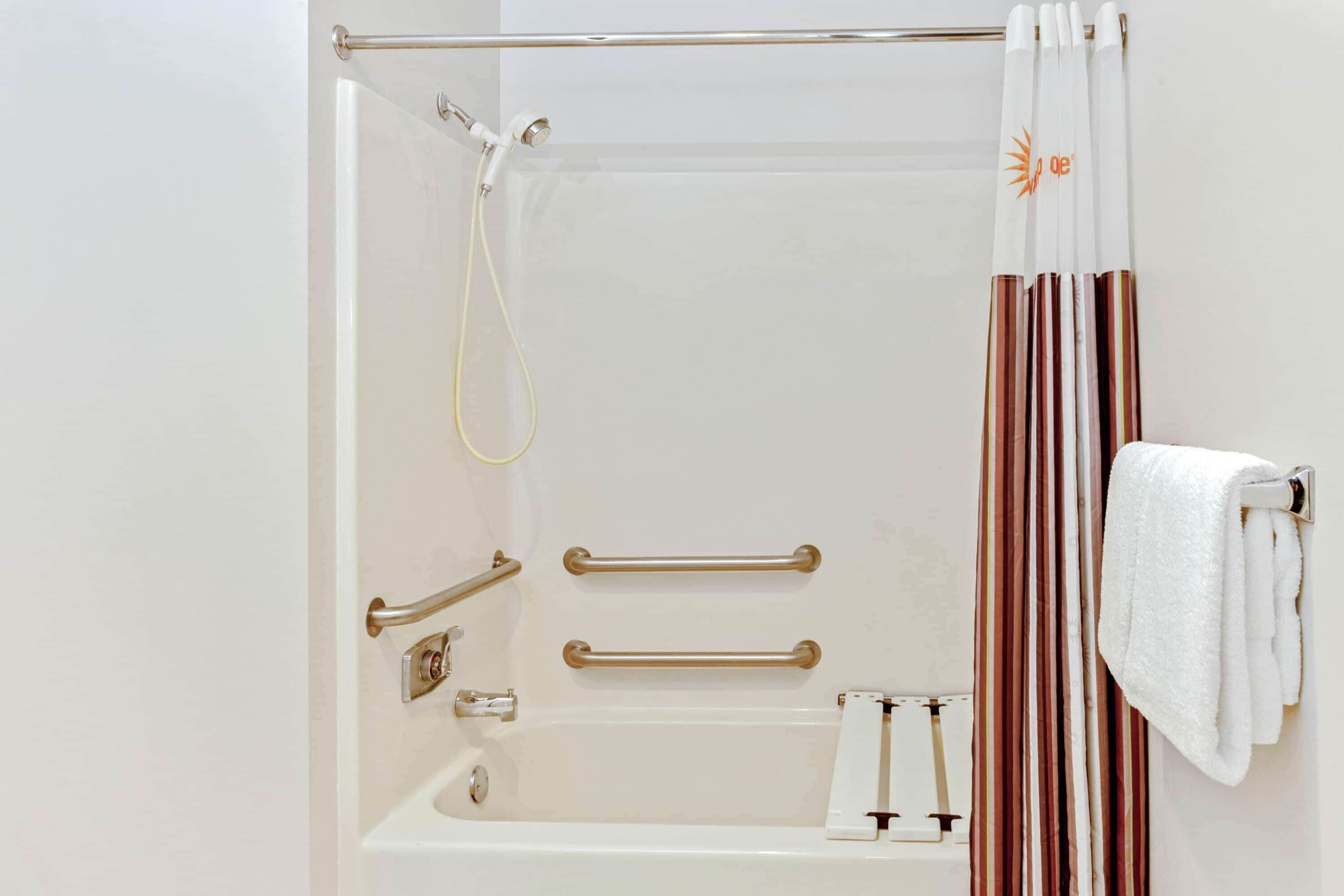 combined shower/bathtub, free toiletries, hair dryer, towels