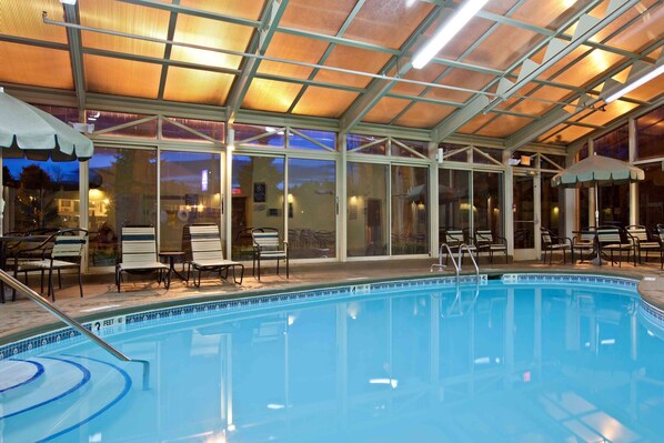 Indoor pool, open 7:00 AM to 11:00 PM, pool umbrellas, pool loungers