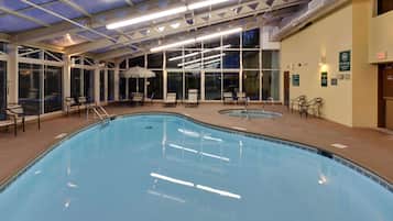 Indoor pool, open 7:00 AM to 11:00 PM, pool umbrellas, pool loungers