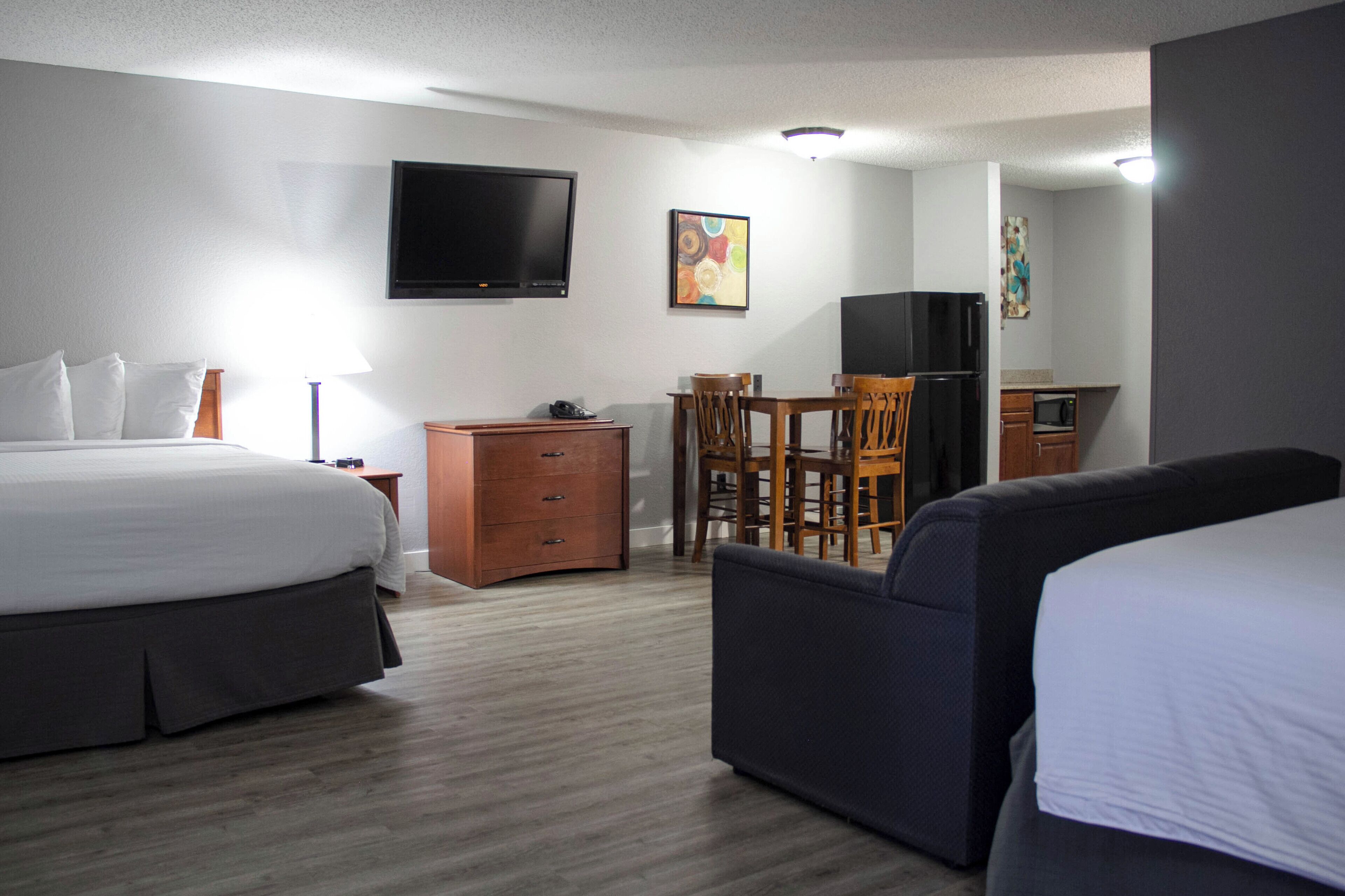 suite, multiple beds | desk, blackout curtains, iron/ironing board, free wifi