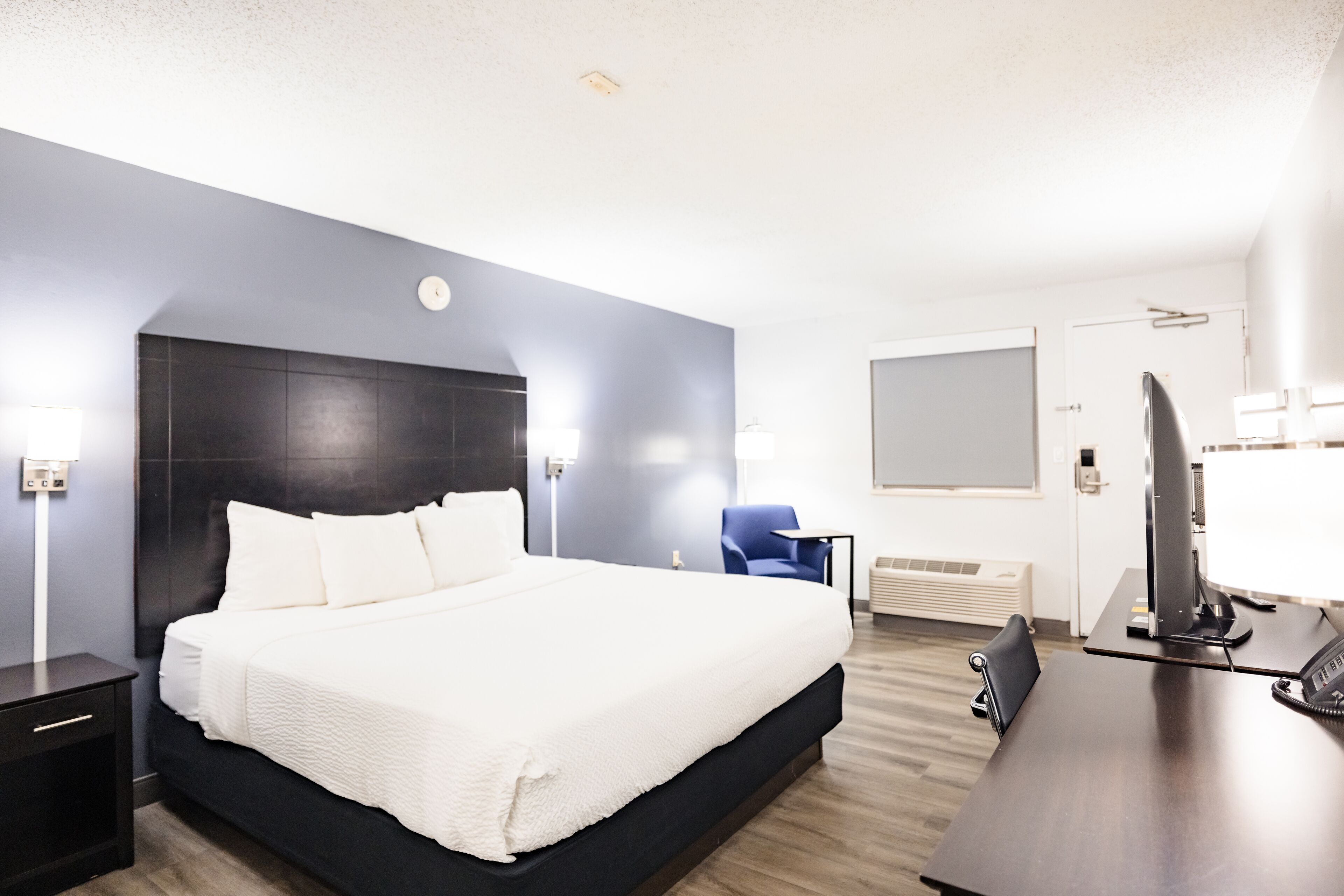 Premium bedding, desk, blackout drapes, iron/ironing board