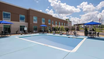 Seasonal outdoor pool, open 8 AM to 9:00 PM, pool loungers
