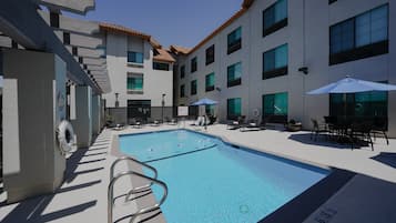 Outdoor pool, open 10:00 AM to 10:00 PM, pool umbrellas, sun loungers