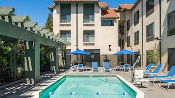 Outdoor pool, open 10:00 AM to 10:00 PM, pool umbrellas, sun loungers