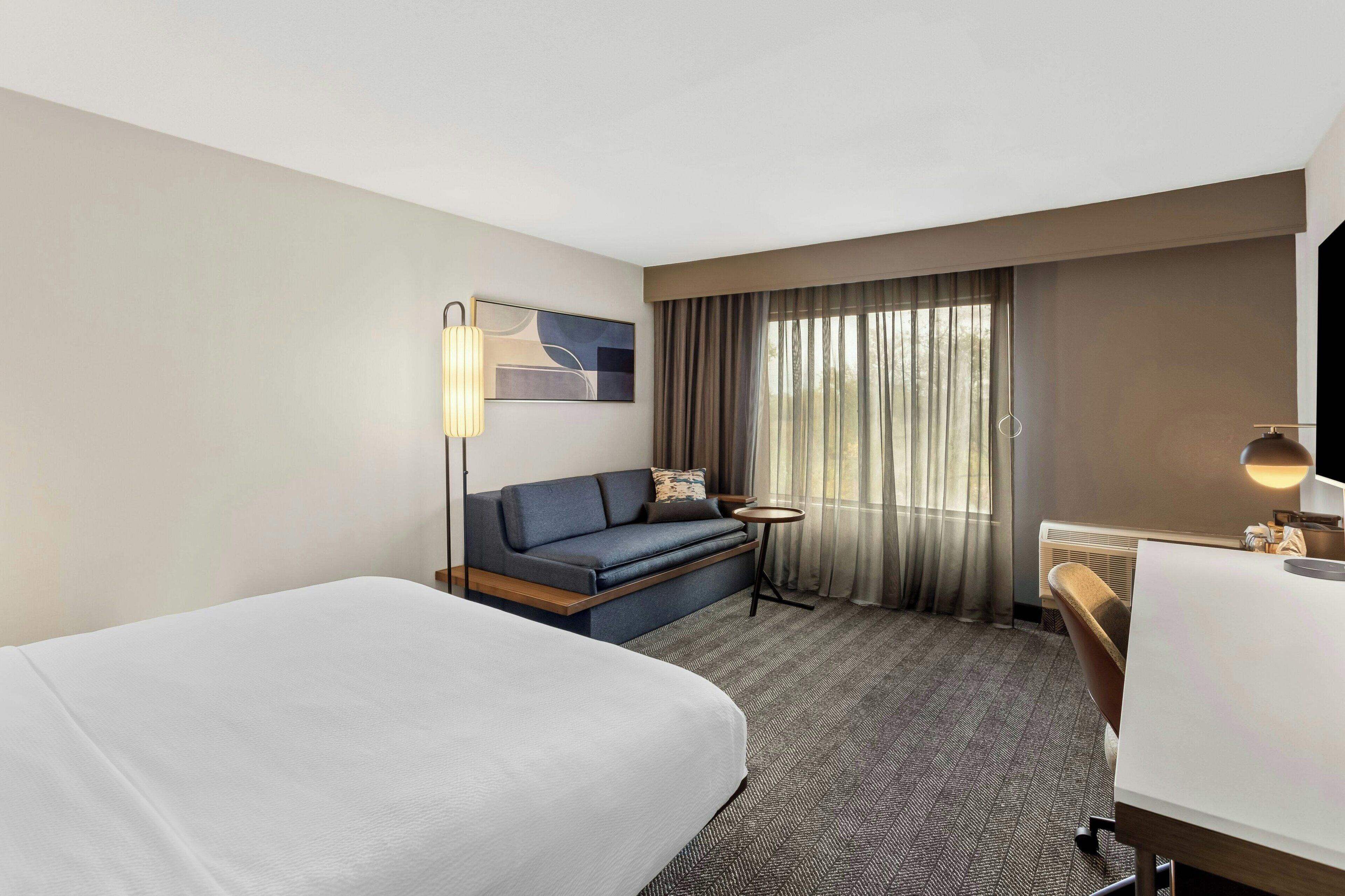 hypo-allergenic bedding, desk, blackout curtains, iron/ironing board