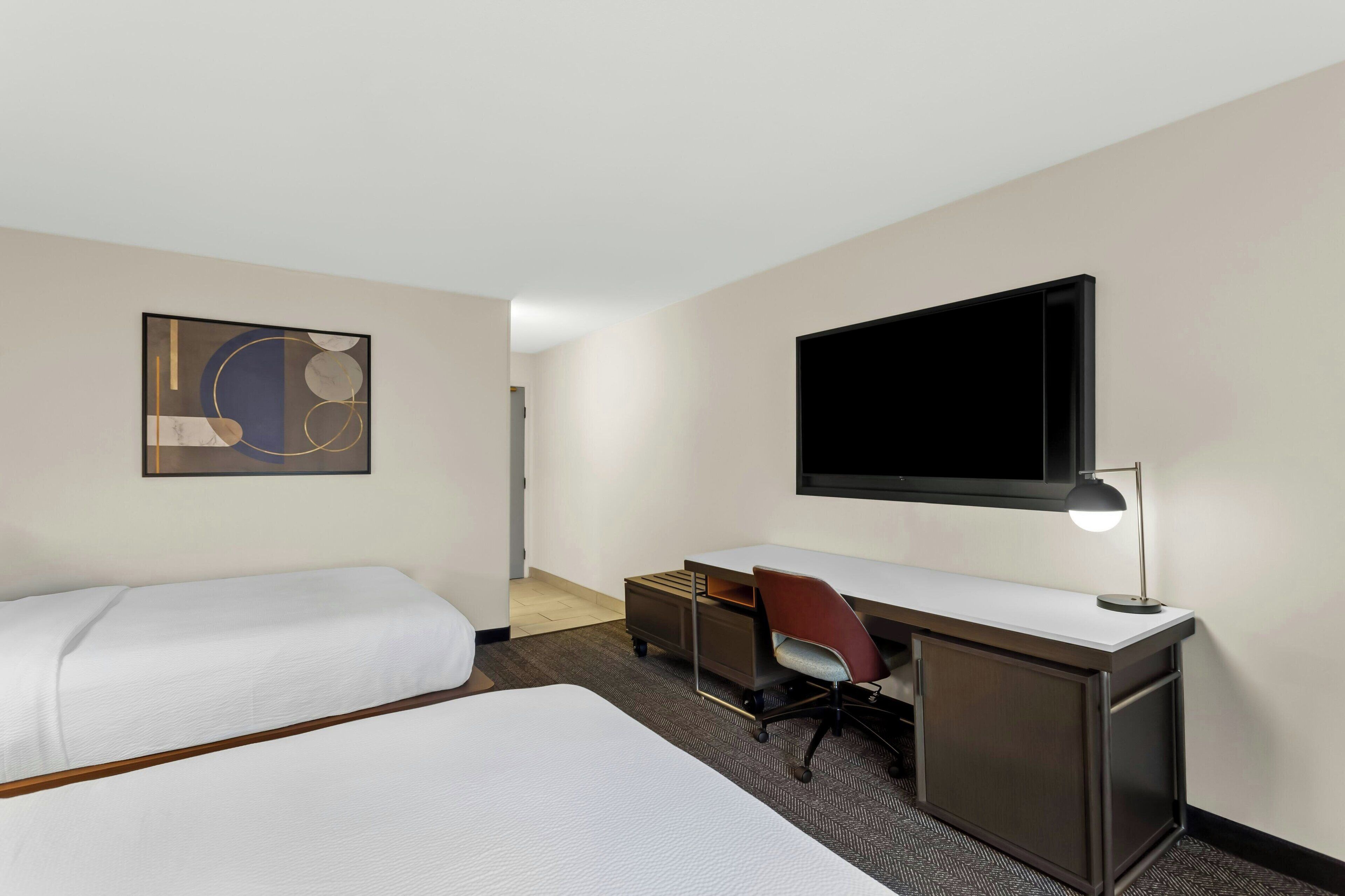 hypo-allergenic bedding, desk, blackout curtains, iron/ironing board