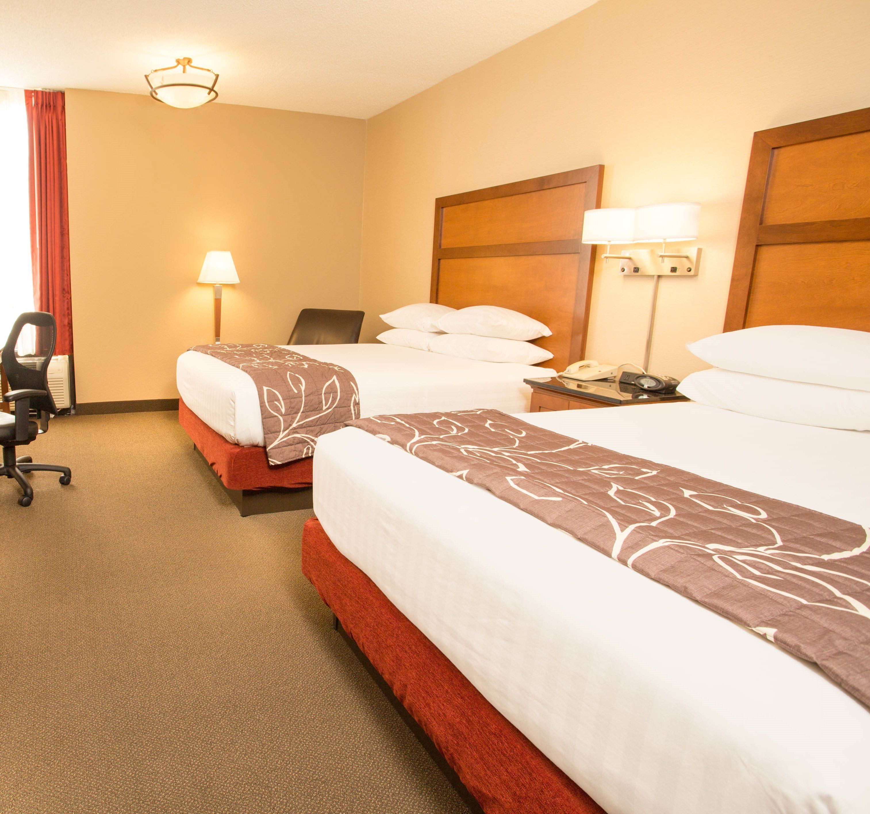 desk, blackout curtains, iron/ironing board, free cots/infant beds