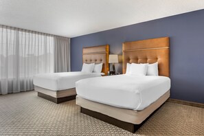 Desk, blackout drapes, iron/ironing board, free cribs/infant beds