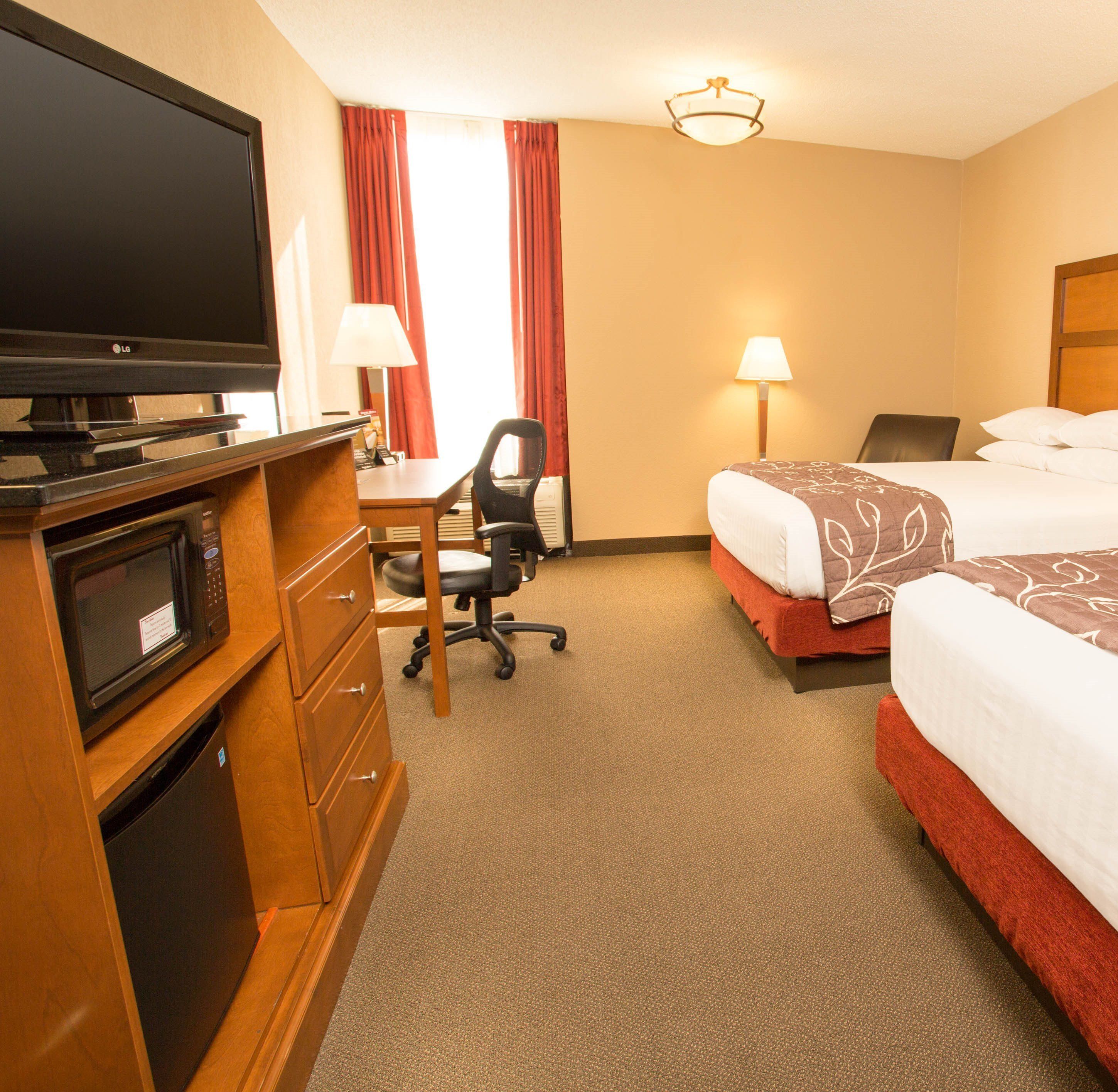 desk, blackout curtains, iron/ironing board, free cots/infant beds