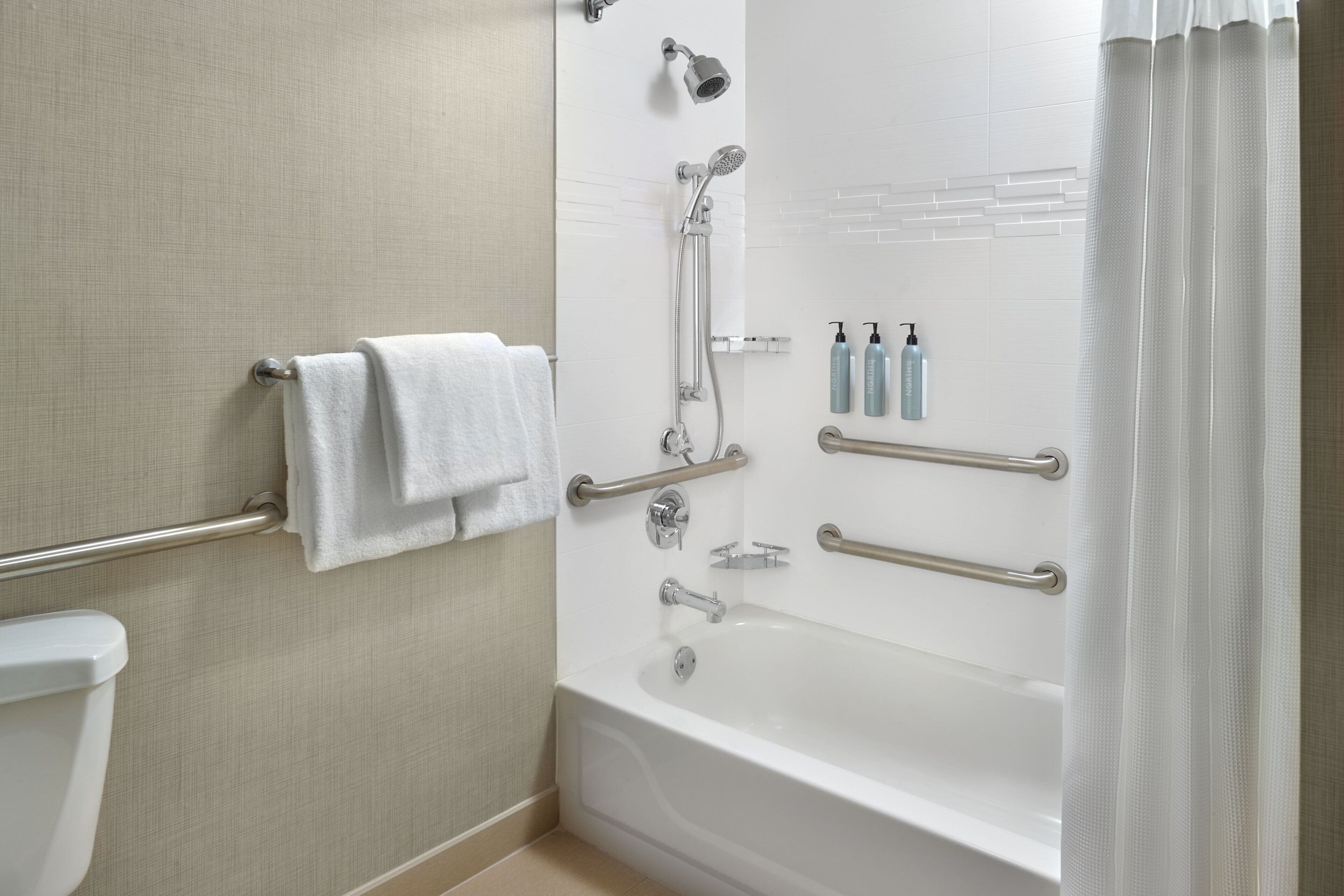 combined shower/bathtub, free toiletries, hair dryer, towels