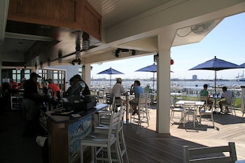 Ocean views, serves lunch and dinner at Harborside at Charleston Harbor Resort and Marina