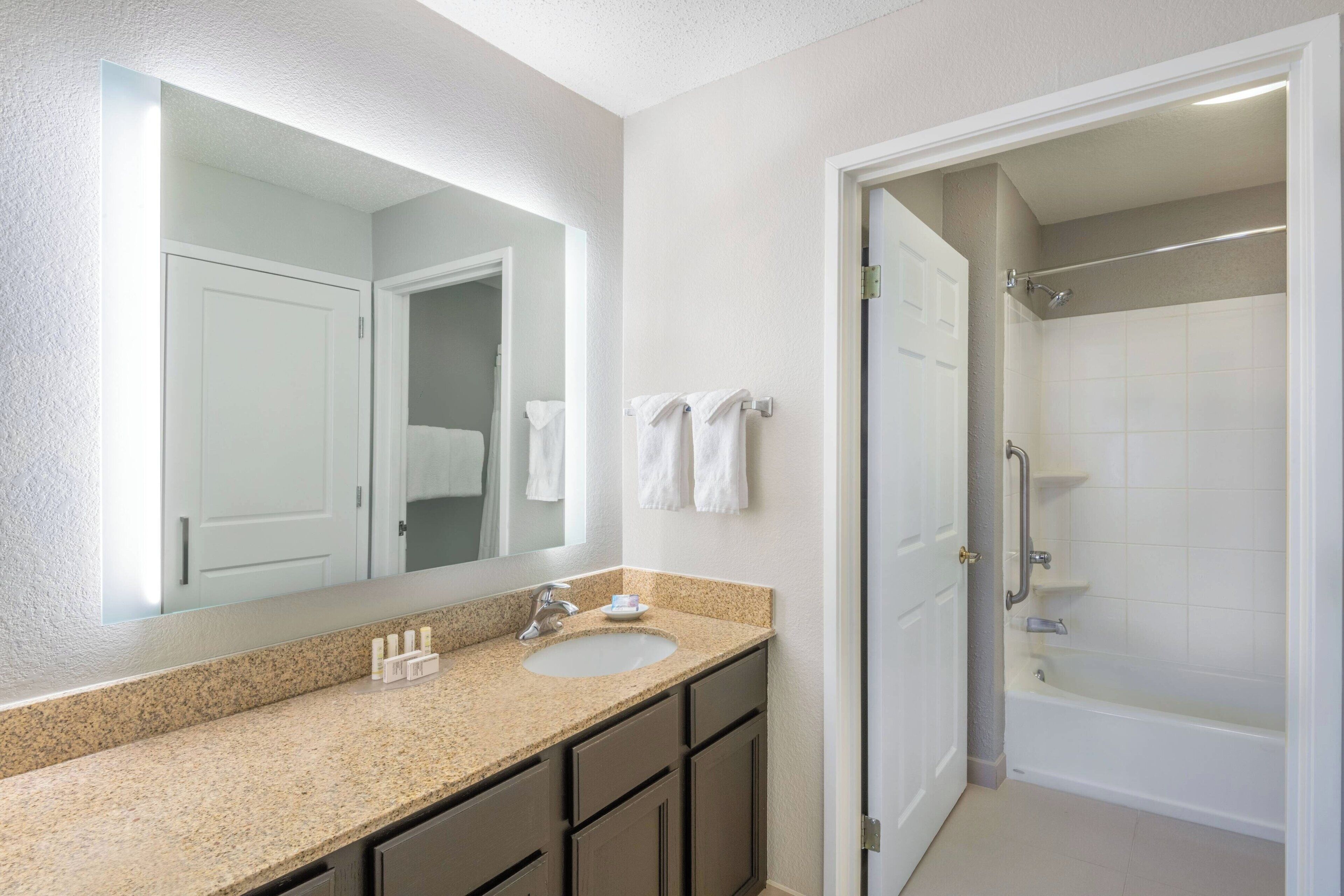 combined shower/bathtub, free toiletries, hair dryer, towels