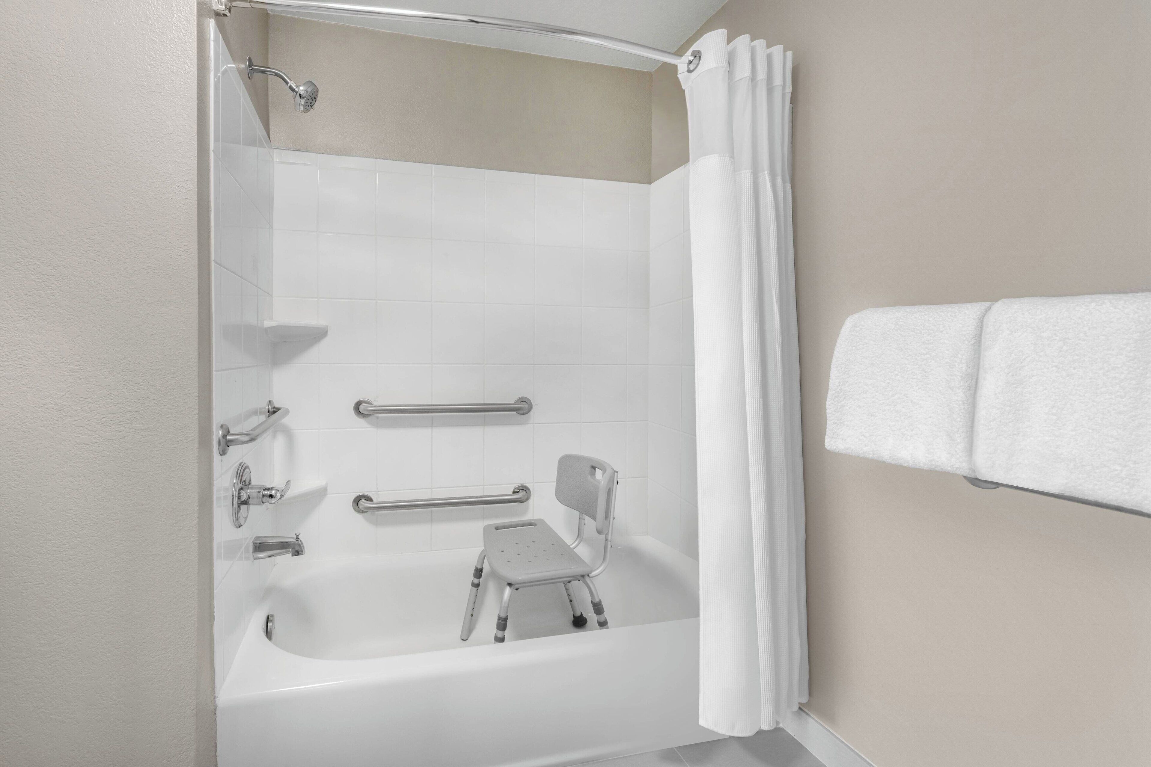combined shower/bathtub, free toiletries, hair dryer, towels