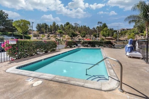 Outdoor pool, open 7:00 AM to 11:00 PM, sun loungers