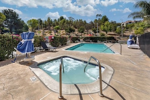 Outdoor pool, open 7:00 AM to 11:00 PM, pool loungers