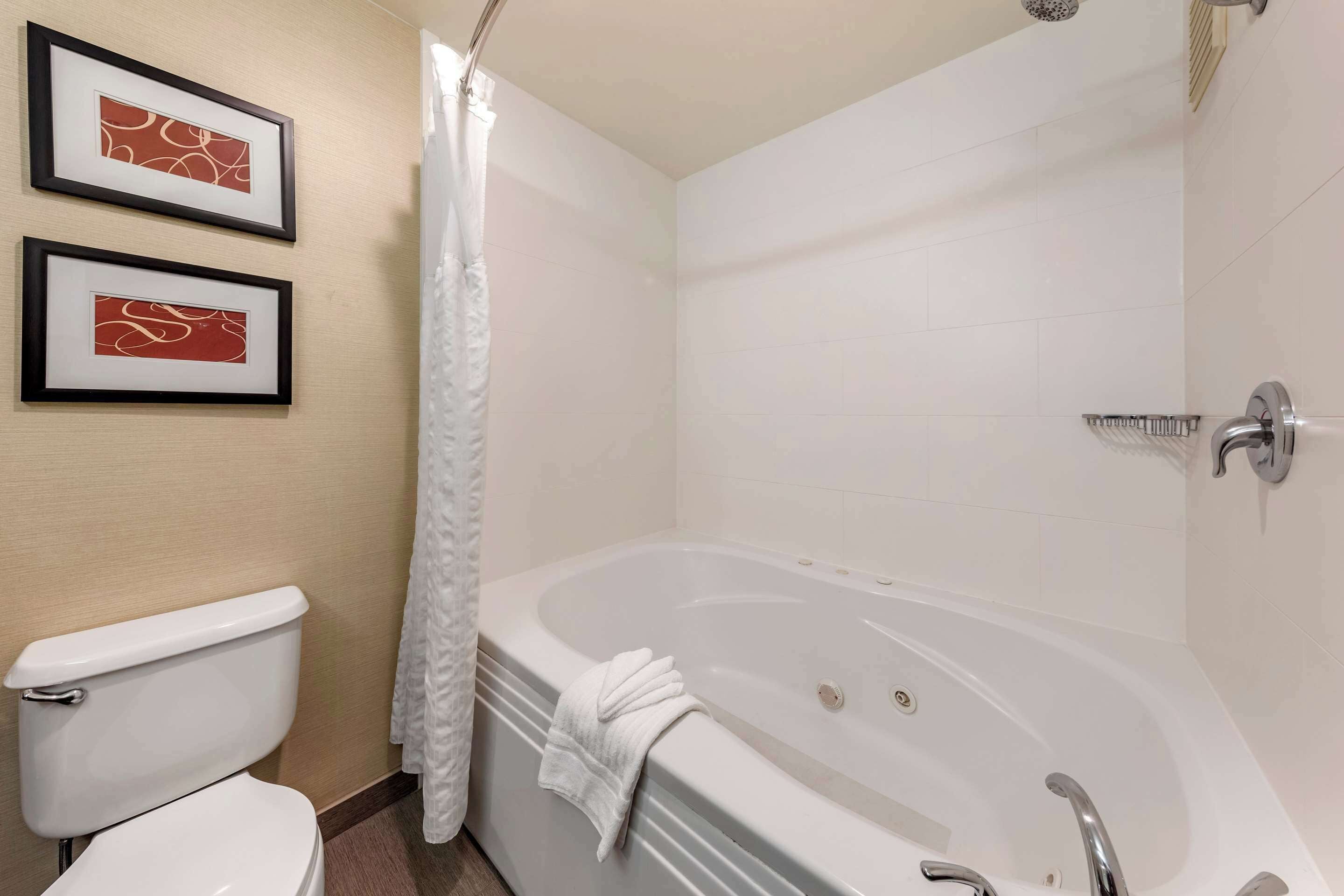 suite, 1 king bed, non smoking | desk, blackout curtains, iron/ironing board, free wifi