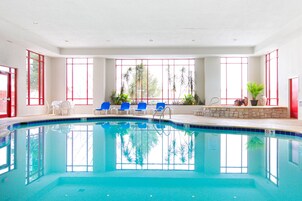 Indoor pool, open 7:00 AM to 11:00 PM, sun loungers