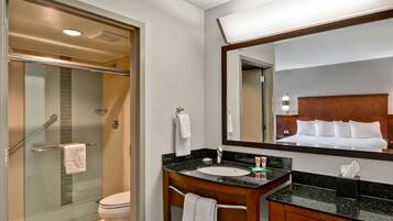 Designer toiletries, hair dryer, towels