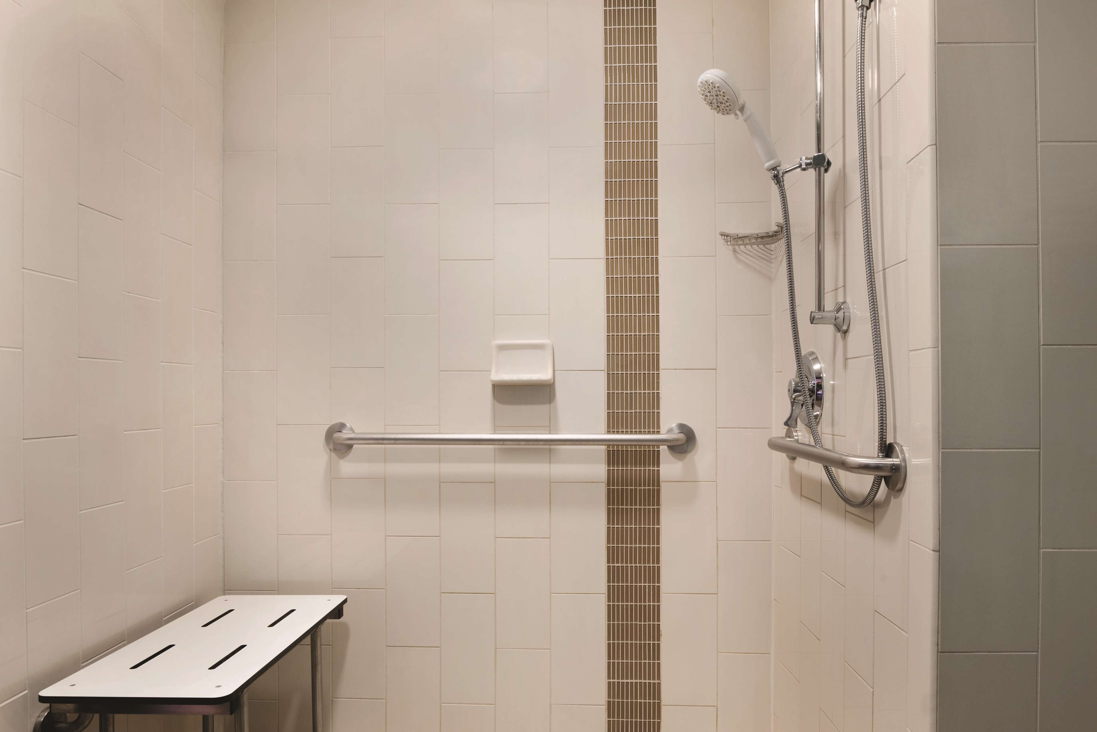 designer toiletries, hair dryer, towels