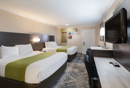 Standard Room, 2 Queen Beds, Accessible, Non Smoking | Desk, laptop workspace, blackout drapes, iron/ironing board. SureStay Hotel by Best Western Rockdale