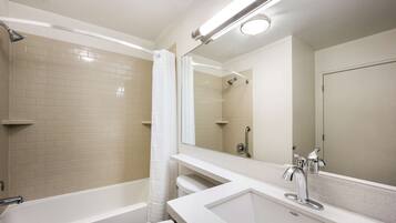 Combined shower/tub, hair dryer, towels, soap
